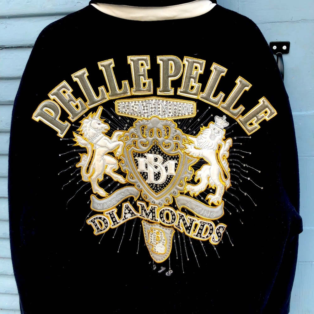 Dark blue pelle pelle lightly worn